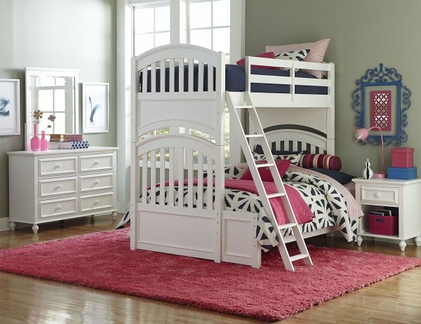 luxury finished interior bedroom with white wood bunk beds with magenta, black and white color scheme and white furniture