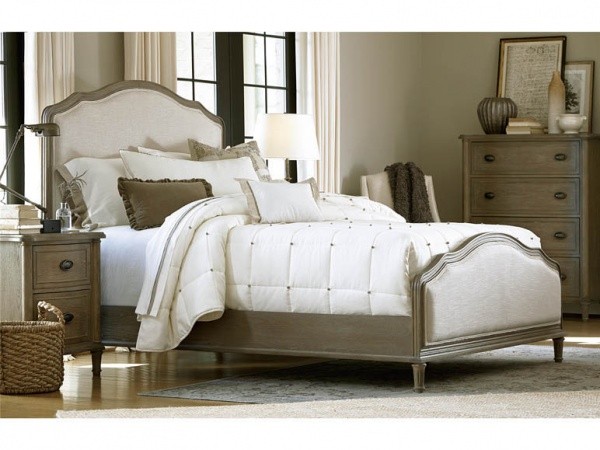 luxury finished interior bedroom with brown and white color scheme, with brown and white bedding and brown wooden furniture